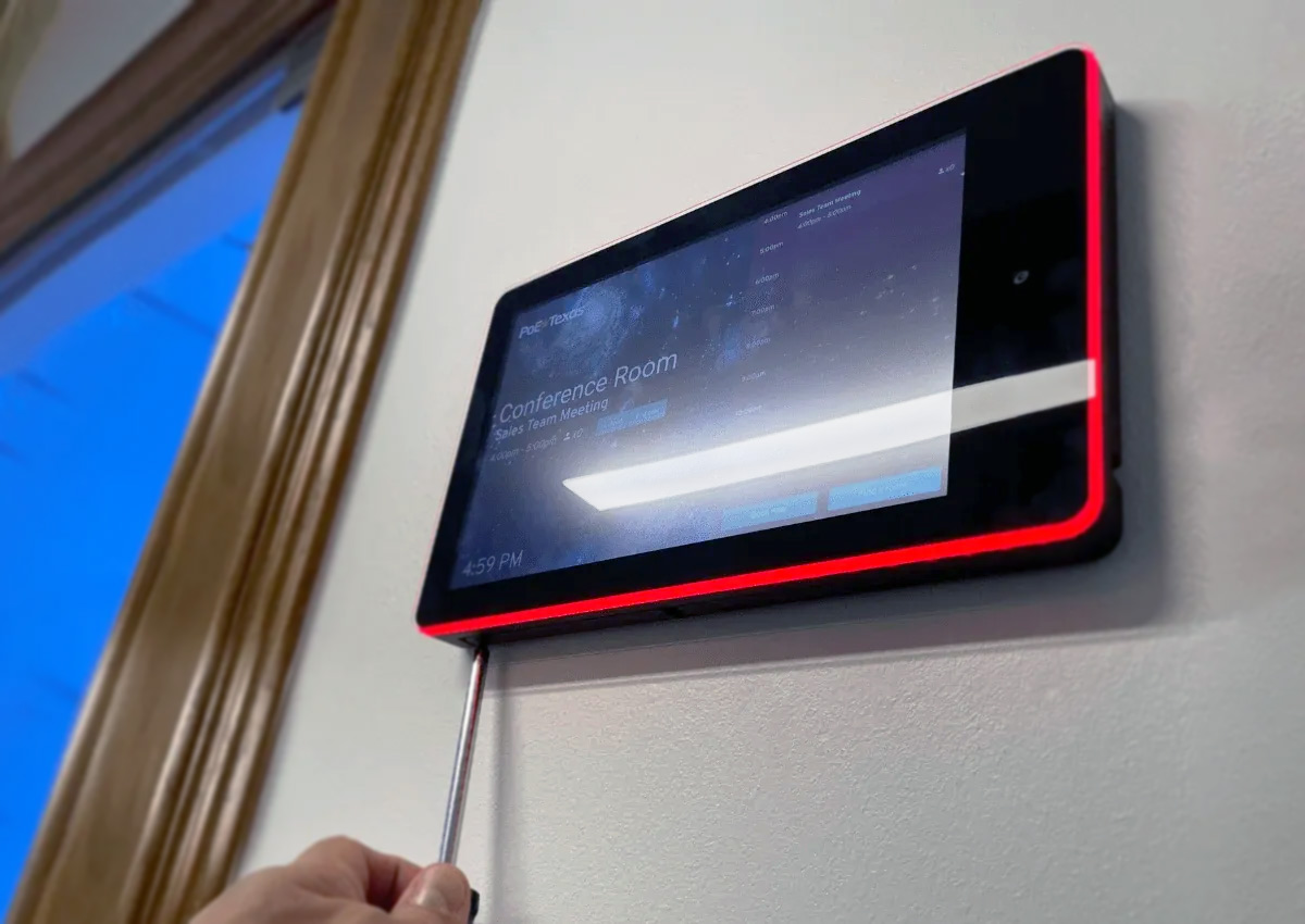 Dash running on a PoE Texas room display panel, showing installation using the built-in wall mount