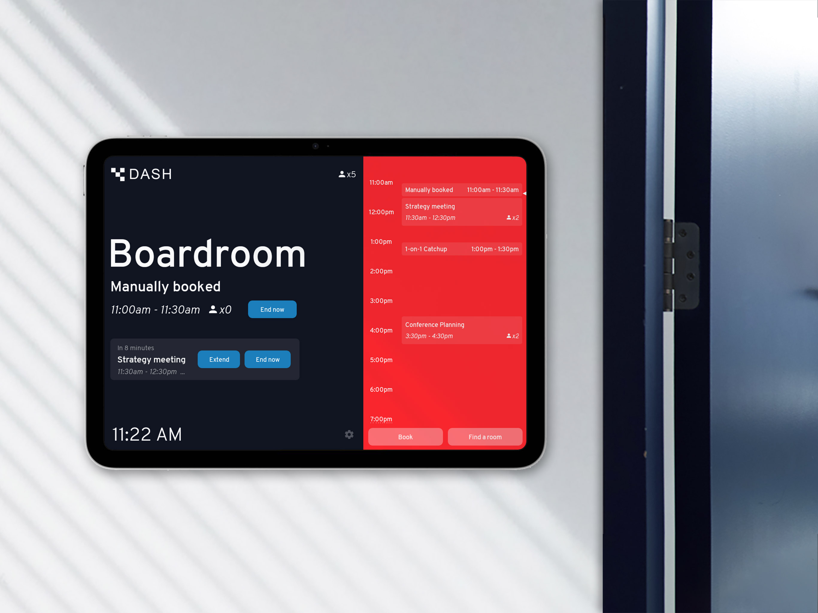 Dash running on an iPad, mounted outside a meeting room